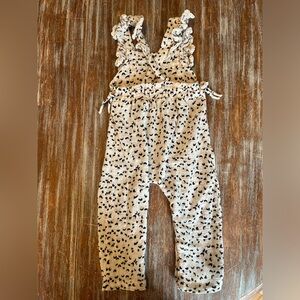 Lightly worn Jessica Simpson romper. Size 24 months.